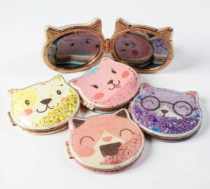 102f0582-b51a-4393-a8b3-f7aa6b957f9c Assorted Cat Face Compact Mirror – Stars in Water