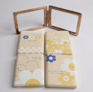 518e95b6-ee7c-4af7-bb70-57b99bd20970 Floral Notebook-Style Compact Mirror (Assorted)