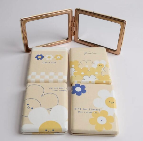 518e95b6-ee7c-4af7-bb70-57b99bd20970 Floral Notebook-Style Compact Mirror (Assorted)